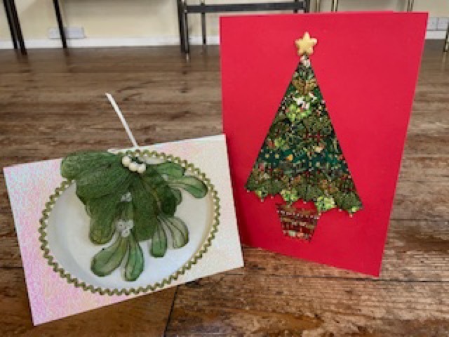 Christmas cards made by Evelyn. The top of the Mistletoe is a broach